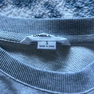 “women of the wave” oneill cropped long sleeve
